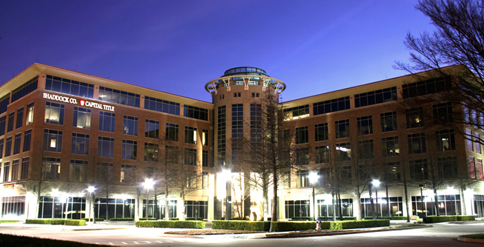 capital title's corporate headquarters building office front at night